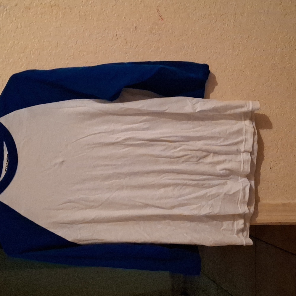A blue and white long sleeve shirt